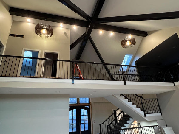 Customer photo (walnut): Crown wooden pendant lights under a vaulted ceiling