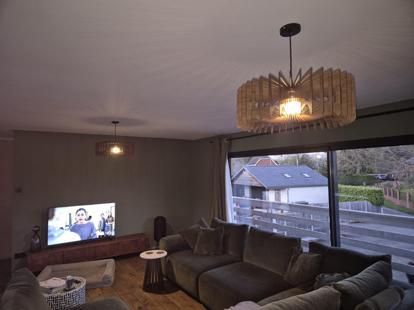 Customer photo (oak): Crown wooden pendant light in a living room