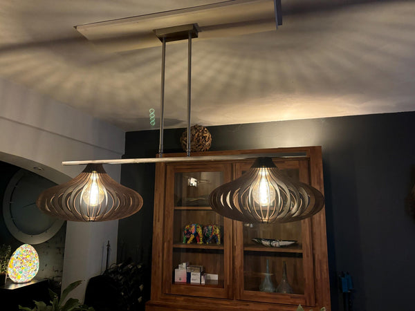 Customer photo (walnut): two Teardrop wooden pendant lights on a ceiling rail