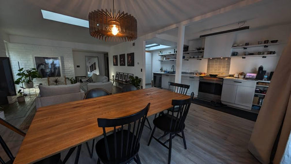 Customer photo (walnut): Crown wooden pendant light over a dining table