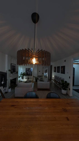 Customer photo (walnut): Crown wooden pendant light in an open-plan dining room
