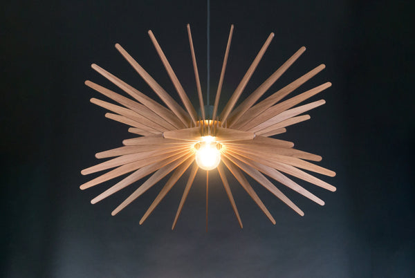 Starburst wooden pendant light – geometric and industrial design for the dining room