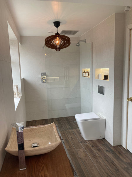 Customer photo (walnut): Medusa wooden pendant light in a bathroom with walk-in shower